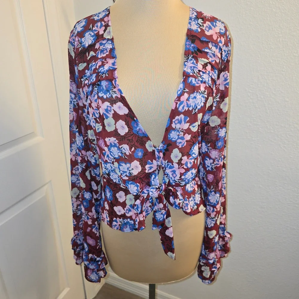 Free People Maybel Floral Print Tie Front Peplum Blouse Long Sleeve Ruffle Cuffs
